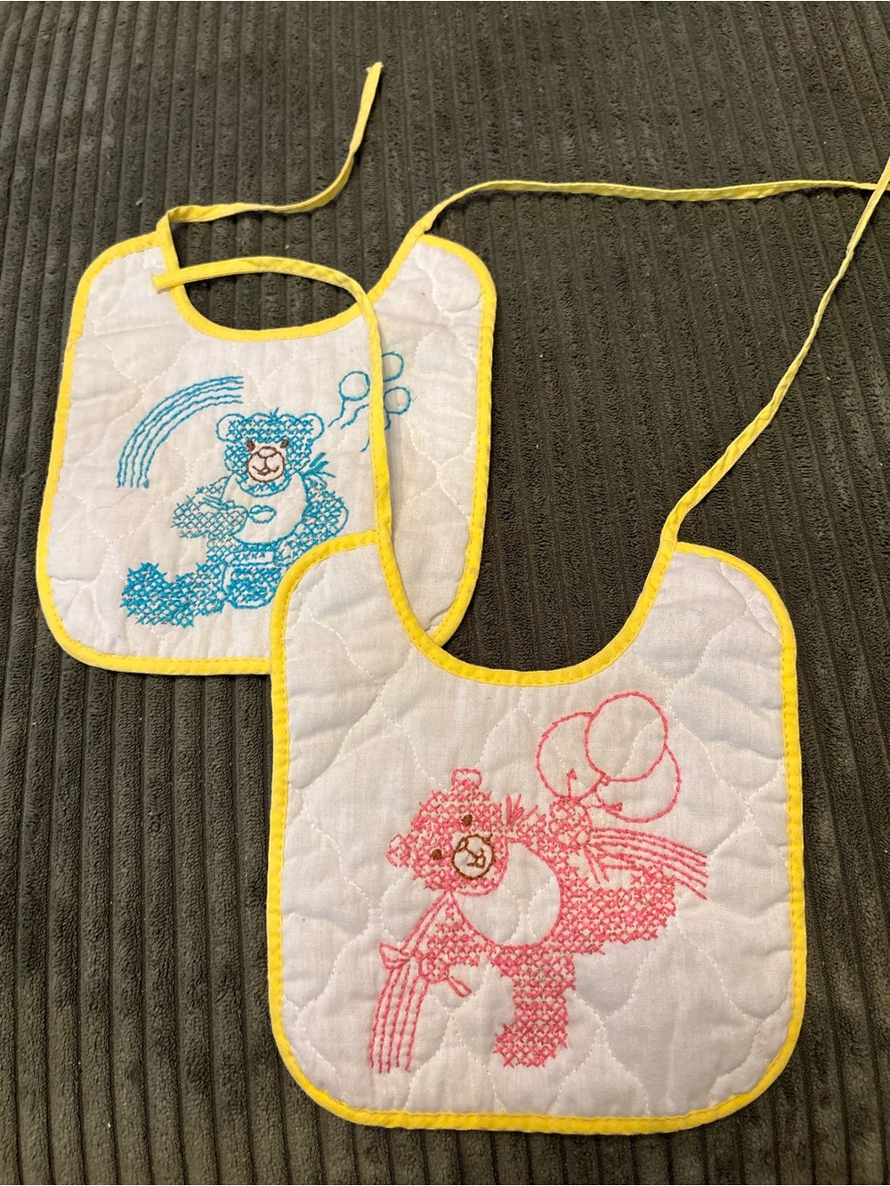 Vintage pair of Yellow-Trim Quilted Baby Bibs with Blue & Pink Bear Embroidery
